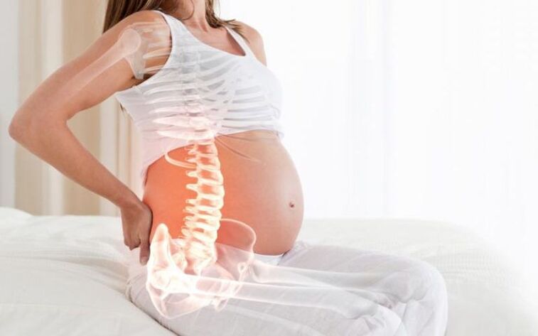 Zwangere vrouwen hebben pijn in de wervelkolom tussen de schouderbladen als gevolg van verhoogde belasting van de rugspieren